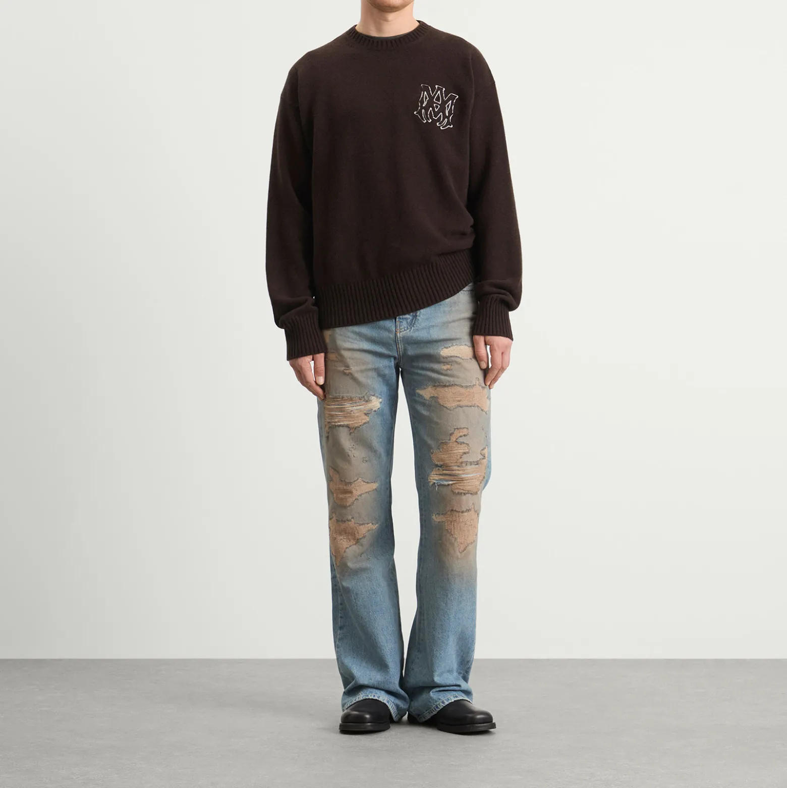 AMIRI Repaired Boot Cut Jeans