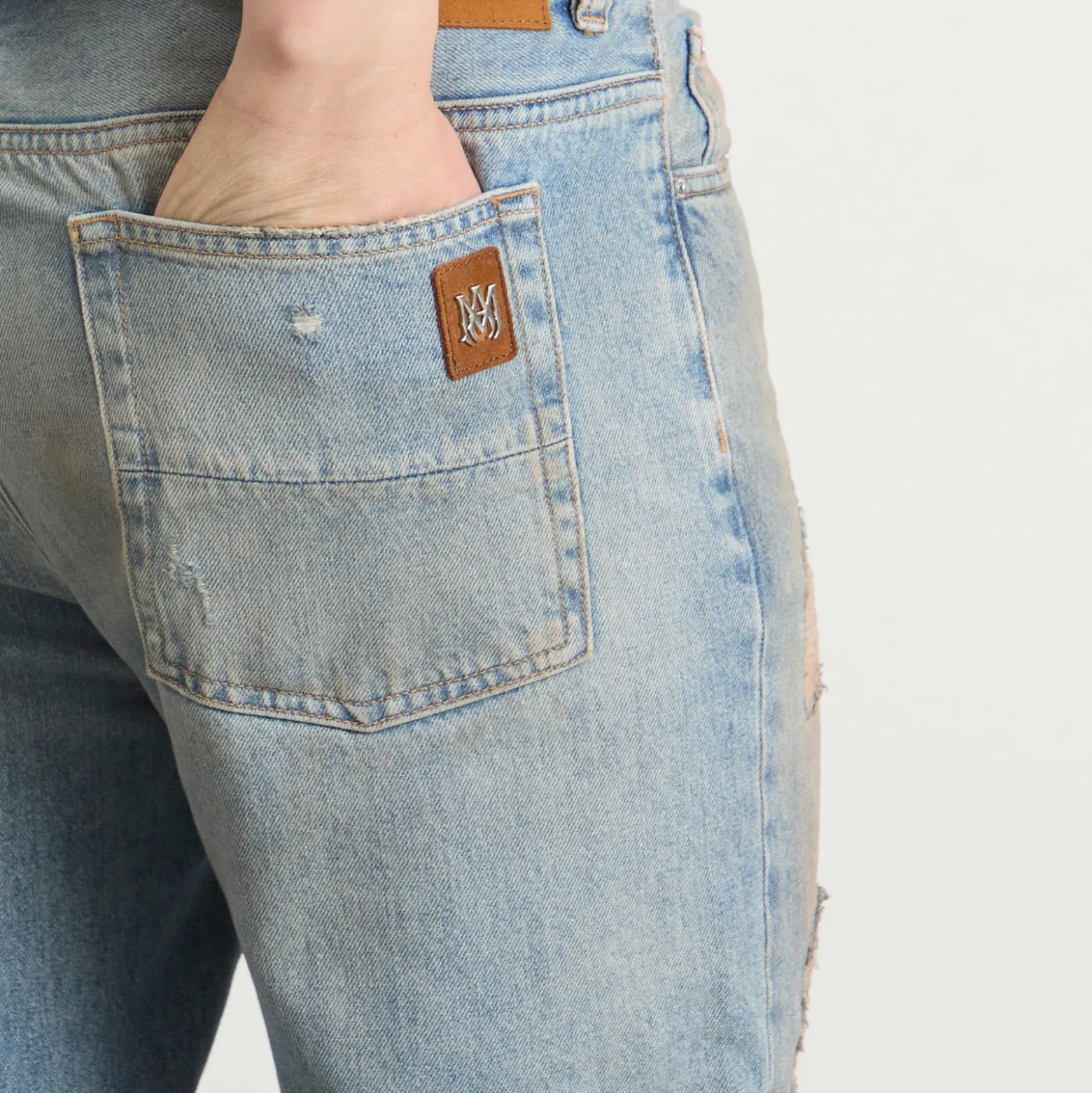 AMIRI Repaired Boot Cut Jeans