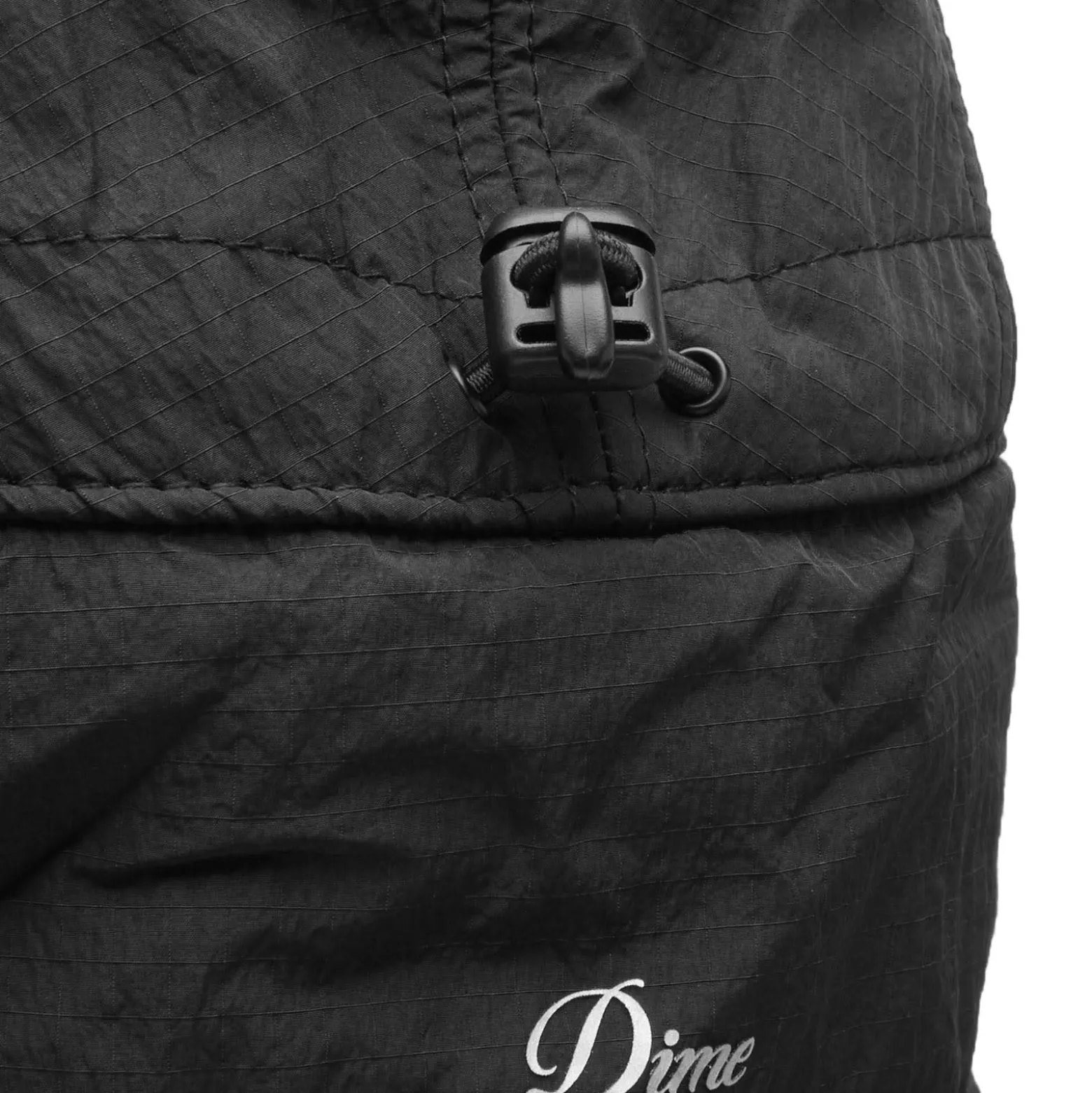 Dime Cursive Earflap Cap