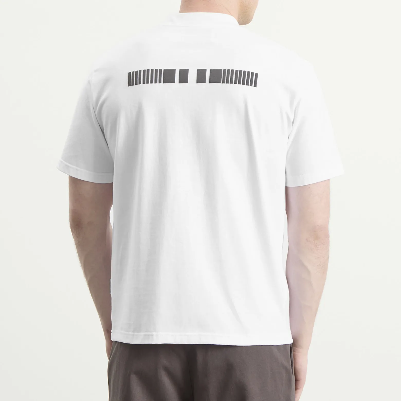 NOMARHYTHM TEXTILE Logo T-Shirt