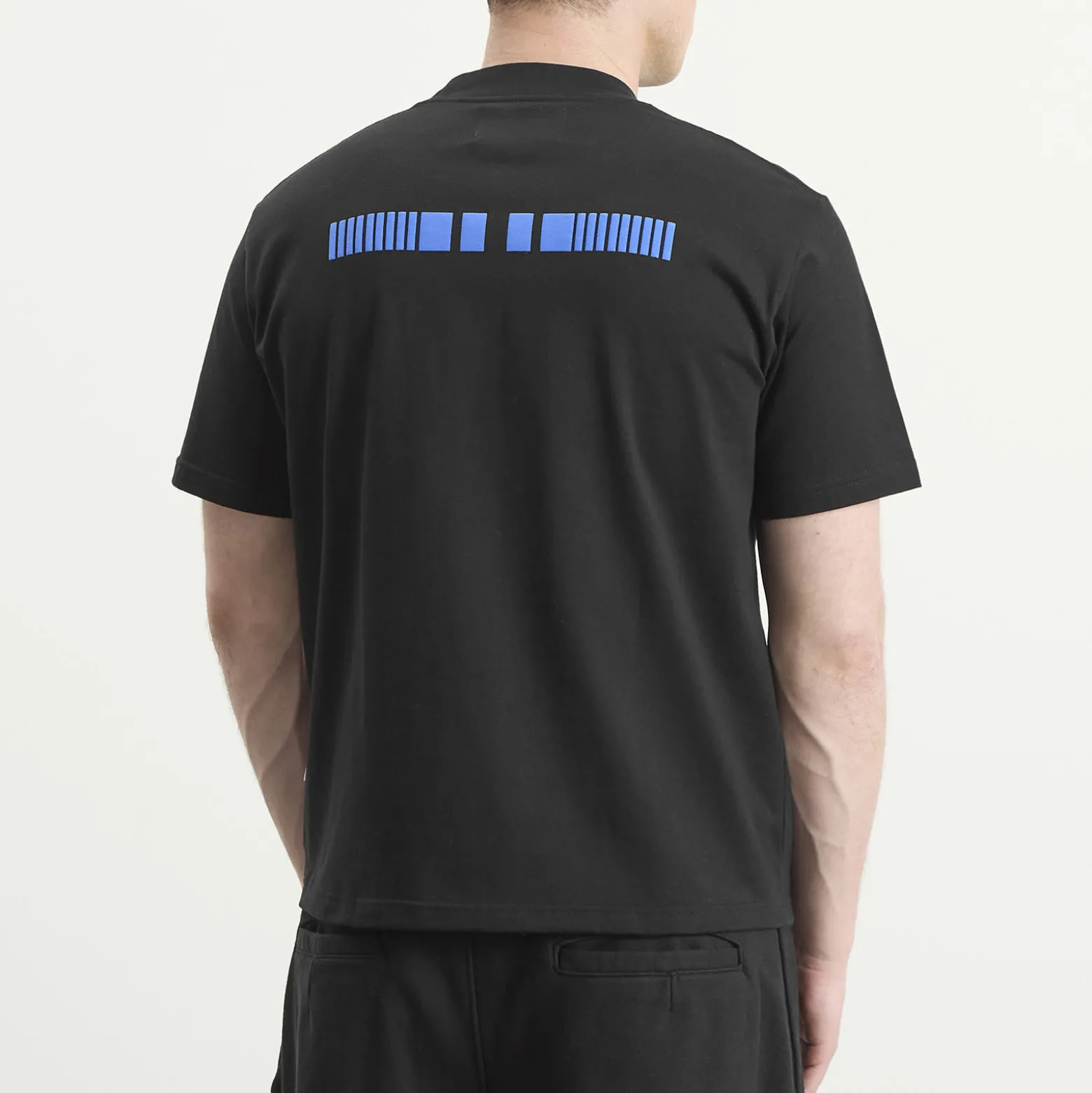 NOMARHYTHM TEXTILE Logo T-Shirt