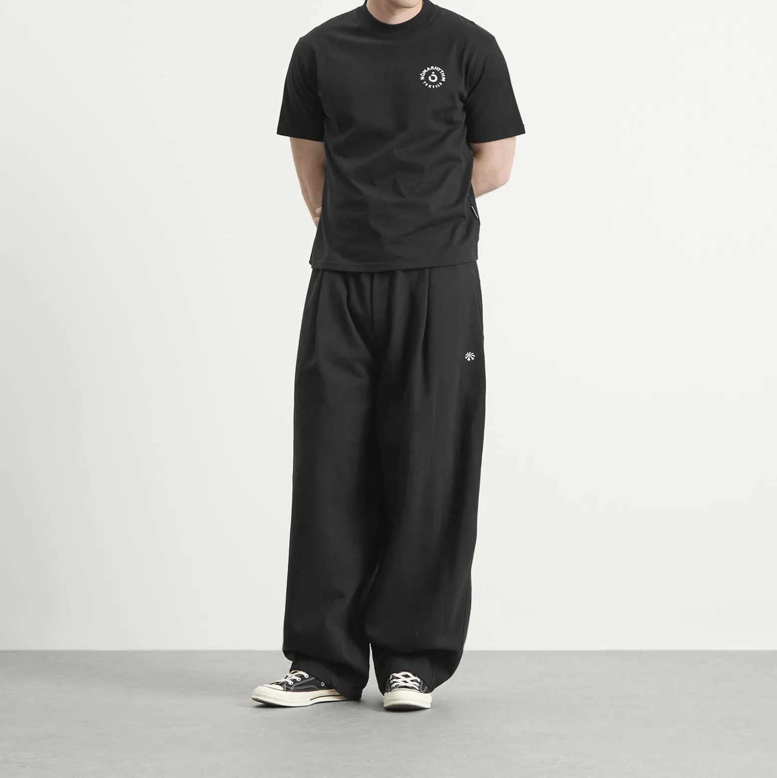 NOMARHYTHM TEXTILE Logo T-Shirt