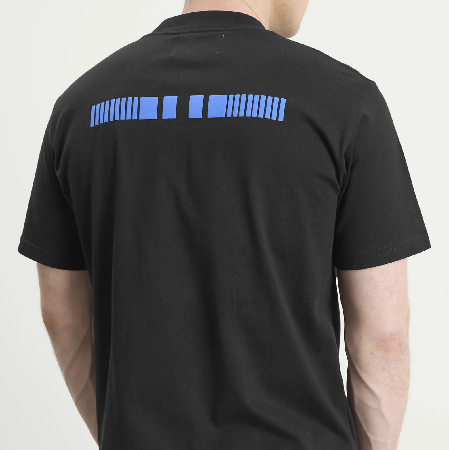 NOMARHYTHM TEXTILE Logo T-Shirt